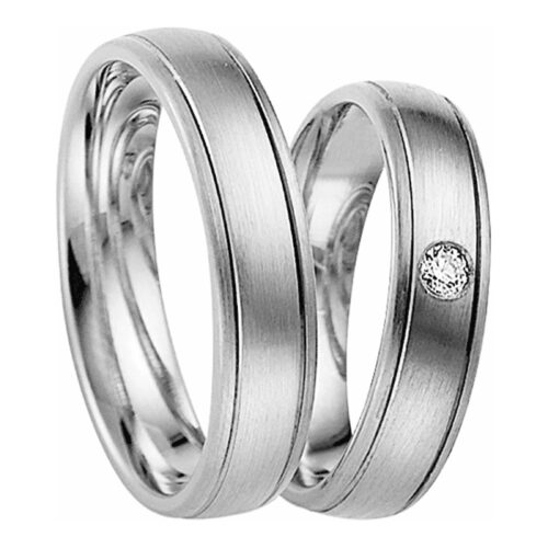 Матовые обручальные кольца из платины с бриллиантом, арт. 8410